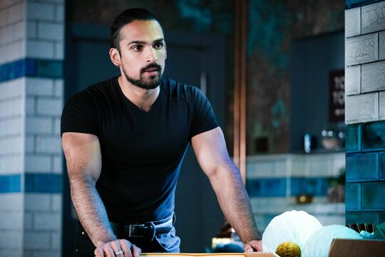 How did Ravi lose the restaurant in EastEnders?
